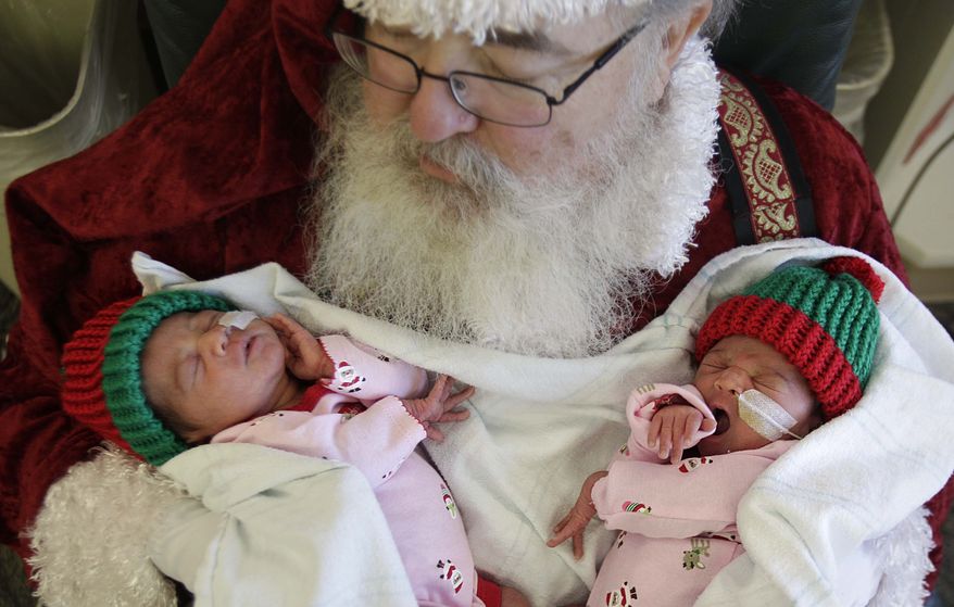 Santa, an industrial engineer who manages the North Pole 364 days a year, is worth an annual salary of $139,924. Moms, who do that and more, only $117,000. (AP Photo)