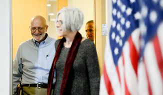 Alan Gross stands with his wife Judy and gives remarks to the media after being released from a Cuban prison where he was held for five years, Washington, D.C., Wednesday, Dec. 17, 2014. Gross was arrested while in Cuba while working as a U.S. government subcontractor for the U.S. Agency for International Development (USAID). (Andrew Harnik/The Washington Times)