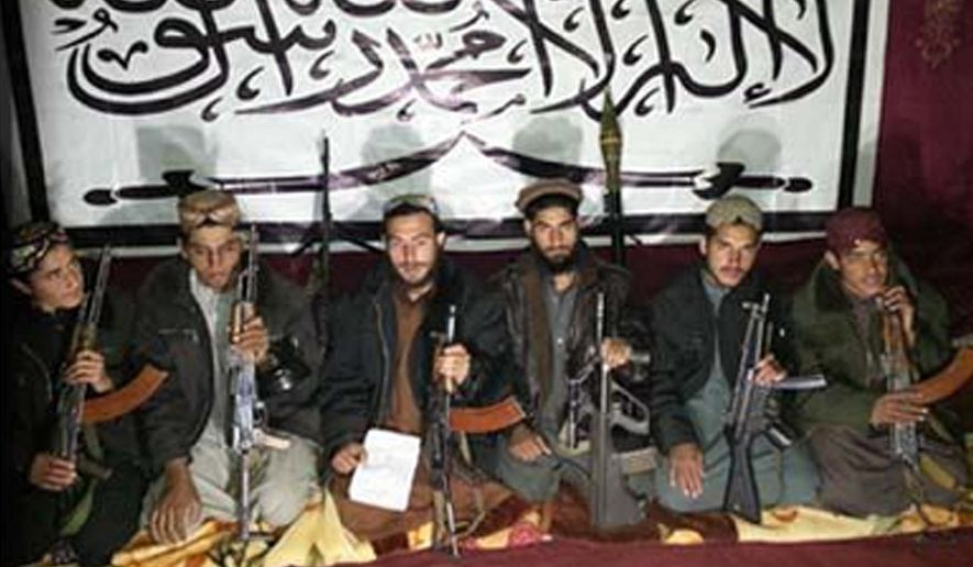 This photo released in a statement by the Pakistani Taliban on Wednesday, Dec. 17, 2014 shows the Taliban fighters who stormed a military-run school in Peshawar, Pakistan on Tuesday, killing more than 140 people, most of them children. In an email on Wednesday, the Pakistani Taliban spokesman Mohammad Khurasani claimed the attack was justified because the Pakistani army has allegedly long been killing innocent children and families of their fighters. (AP Photo/Pakistani Taliban handout)