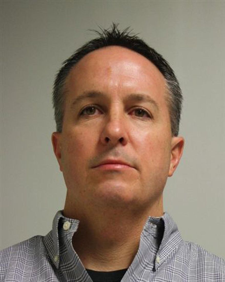 This Wednesday, Dec. 17, 2014 booking photo released by the Wrentham, Mass., Police Department shows Barry Cadden, co-founder of the New England Compounding Center, arrested Wednesday at his home. Cadden is among several arrested who face charges that tainted steroids manufactured by the pharmacy were blamed for a fungal meningitis outbreak that killed 64 people across the country. (AP Photo/Wrentham Police Department)