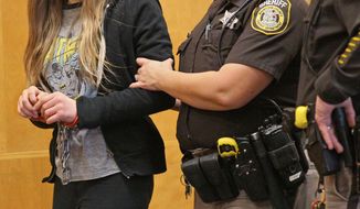 Two girls were arrested in the stabbing of a third girl in late 2014. They told detectives that the attack was an attempt to please Slender Man, a fictional character they found on a horror website. (Associated Press/File)
