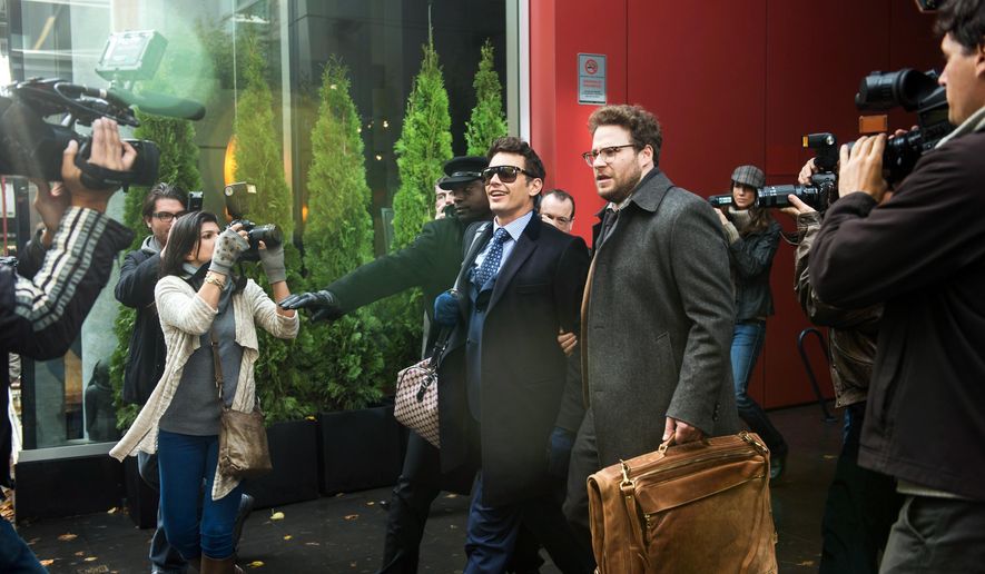 This photo provided by Columbia Pictures - Sony shows, James Franco, center left, as Dave, and Seth Rogen as Aaron, in Columbia Pictures' "The Interview." (AP Photo/Columbia Pictures - Sony, Ed Araquel)