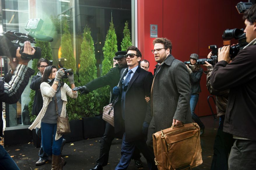 This photo provided by Columbia Pictures - Sony shows, James Franco, center left, as Dave, and Seth Rogen as Aaron, in Columbia Pictures' "The Interview." (AP Photo/Columbia Pictures - Sony, Ed Araquel)