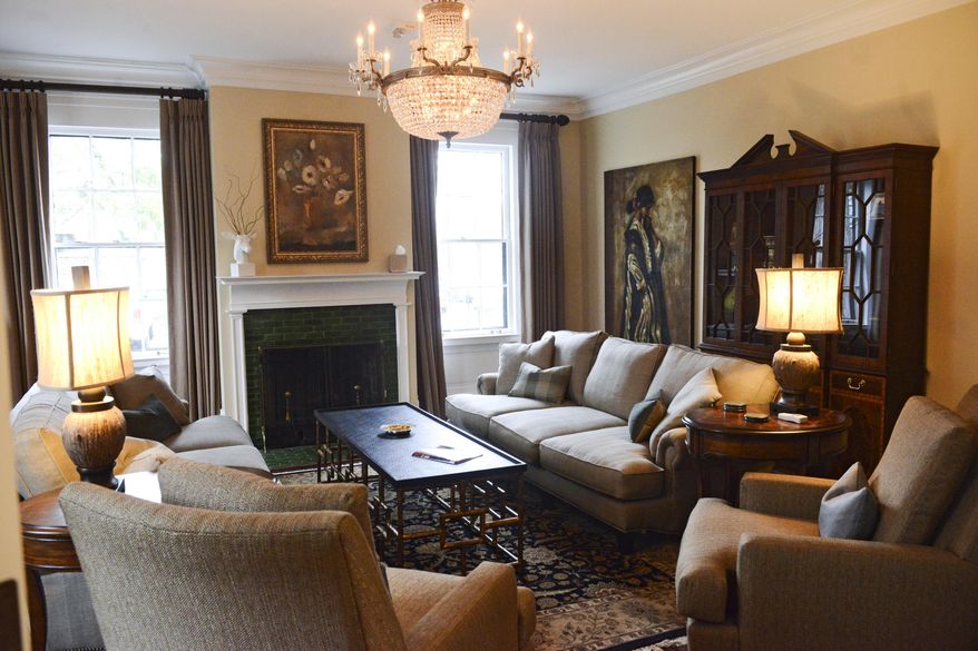 This photo taken on Dec. 11, 2014, shows the living room of the Sanford House in Grand Rapids, Mich., that has been restored to serve as a meeting and media room for the home's residents. (AP Photo/The Grand Rapids Press, Emily Rose Bennett) ALL LOCAL TELEVISION OUT; LOCAL TELEVISION INTERNET OUT