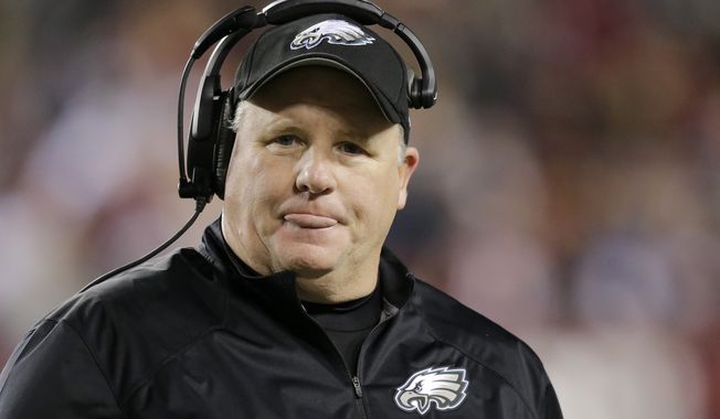 Philadelphia Eagles head coach Chip Kelly reacts to a play during the first half of an NFL football game against the Washington Redskins in Landover, Md., Saturday, Dec. 20, 2014. (AP Photo/Mark Tenally)