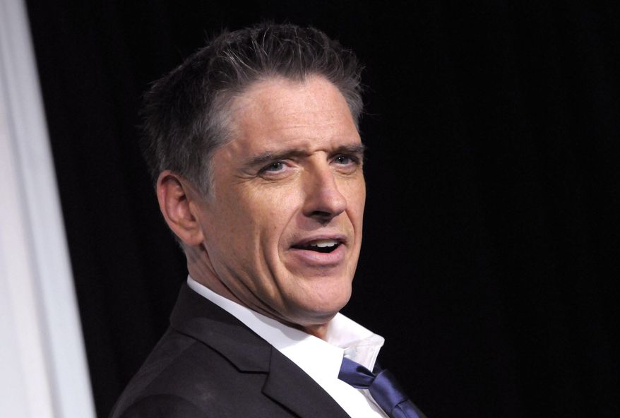 FILE - In this Dec. 1, 2012 file photo, Craig Ferguson appears backstage at the Grammy Nominations Concert, in Los Angeles. Ferguson will spend tomorrow's future yesterdays (as his theme song proclaims) somewhere other than "The Late Late Show." Friday Dec. 19, 2014 was his last hoorah after a decade as host of the CBS talk show. (AP Photo/Dan Steinerg, File)