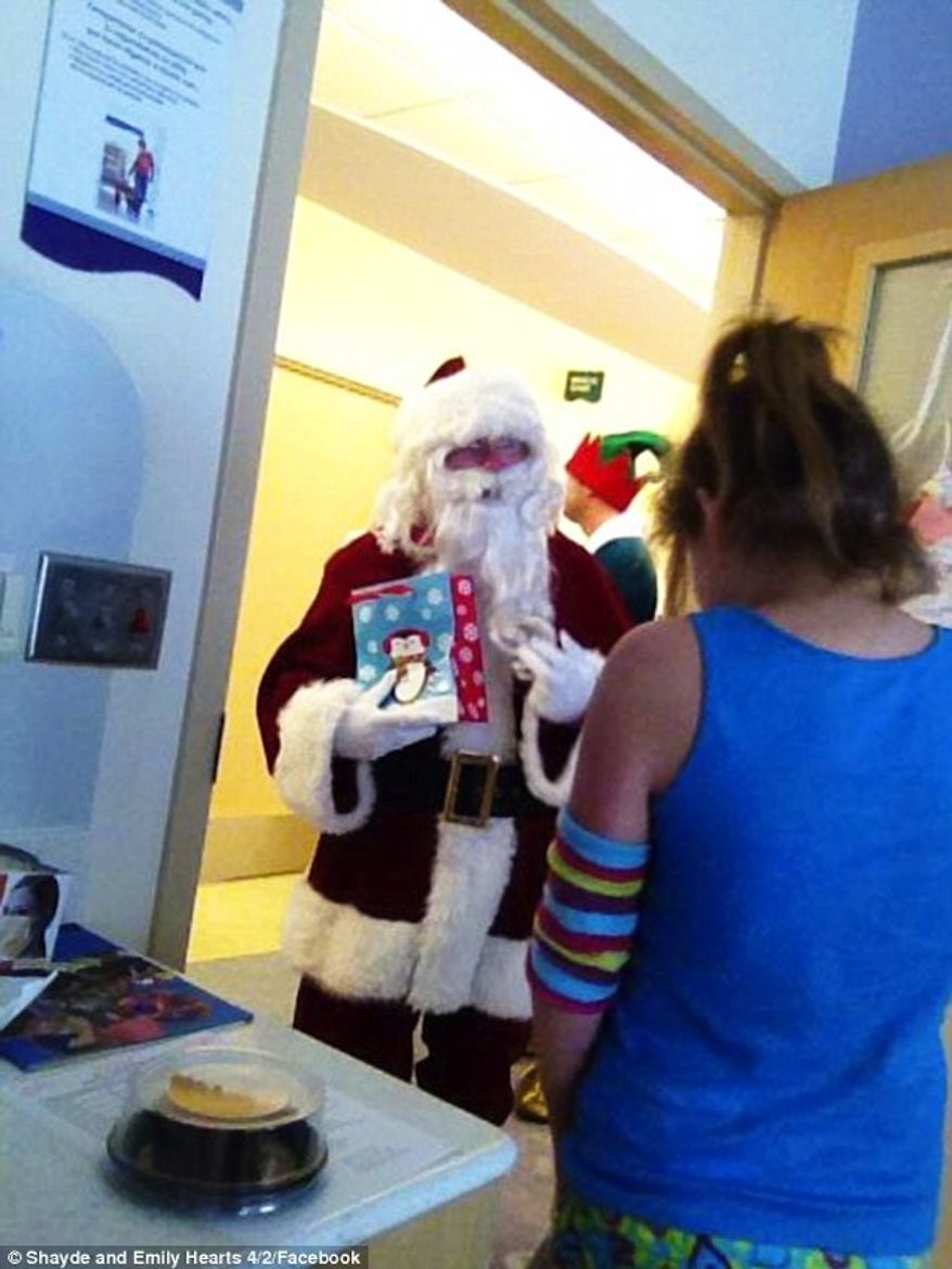 Former President George W. Bush quietly disguised himself as Santa Claus and handed out toys at the Children&#x27;s Medical Center of Dallas last week. (Facebook/Shayde and Emily Hearts 4/2)