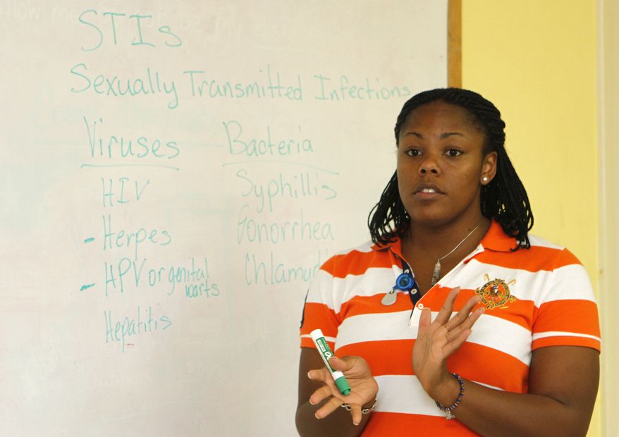 Sex education teacher Shayna Knowles leads a class at St. Andrew's Episcopal Church in Lake Worth, Fla., in this Sept. 10, 2010, file photo. A new study by Child Trends finds that all kinds of sex-education programs can be successful. (AP Photo/Alan Diaz)