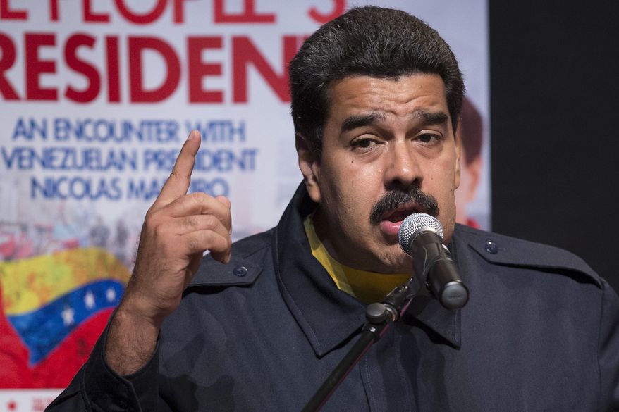 President Nicolas Maduro — the hand-picked successor to the late socialist Hugo Chavez — faces mounting international criticism for jailing opposition figures after months of street protests. (Associated Press)