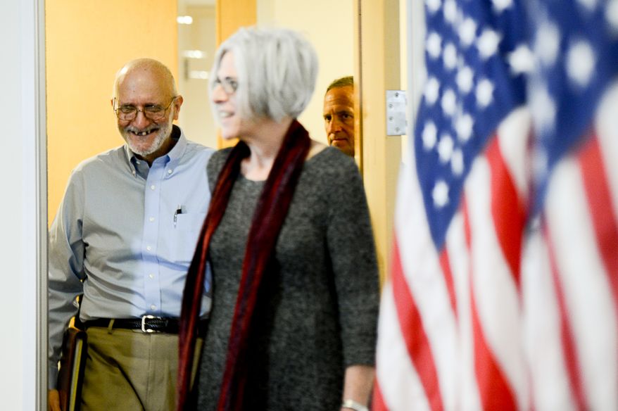 Alan Gross stands with his wife Judy and gives remarks to the media after being released from a Cuban prison where he was held for 5 years, Washington, D.C., Wednesday, December 17, 2014. Gross was arrested while in Cuba while working as a U.S. government subcontractor for the U.S. Agency for International Development (USAID). (Andrew Harnik/The Washington Times)