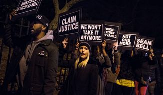 Protesters chant as they rally outside Gracie Mansion in New York City on Dec. 15.