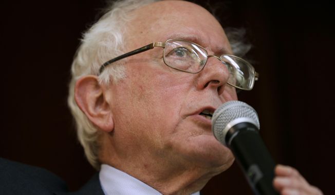 Sen. Bernie Sanders, I-Vt., speaks during a town hall meeting in Ames, Iowa, in this Dec. 16, 2014, file photo. Sanders says he’ll decide by March whether to launch a 2016 presidential campaign. (AP Photo/Charlie Neibergall, File)