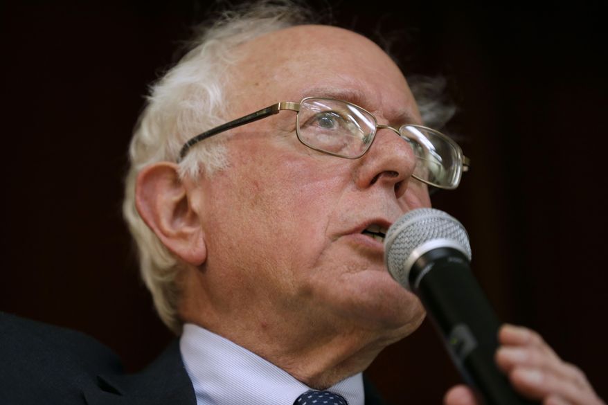 Sen. Bernie Sanders, I-Vt., speaks during a town hall meeting in Ames, Iowa, in this Dec. 16, 2014, file photo. Sanders says he’ll decide by March whether to launch a 2016 presidential campaign. (AP Photo/Charlie Neibergall, File)