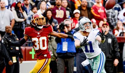 Dallas Cowboys wide receiver Cole Beasley (11) can&#39;t haul in a deep pass at the end of the first half as the Washington Redskins play the Dallas Cowboys the at FedExField, Landover, Md., Sunday, December 28, 2014. (Andrew Harnik/The Washington Times)
