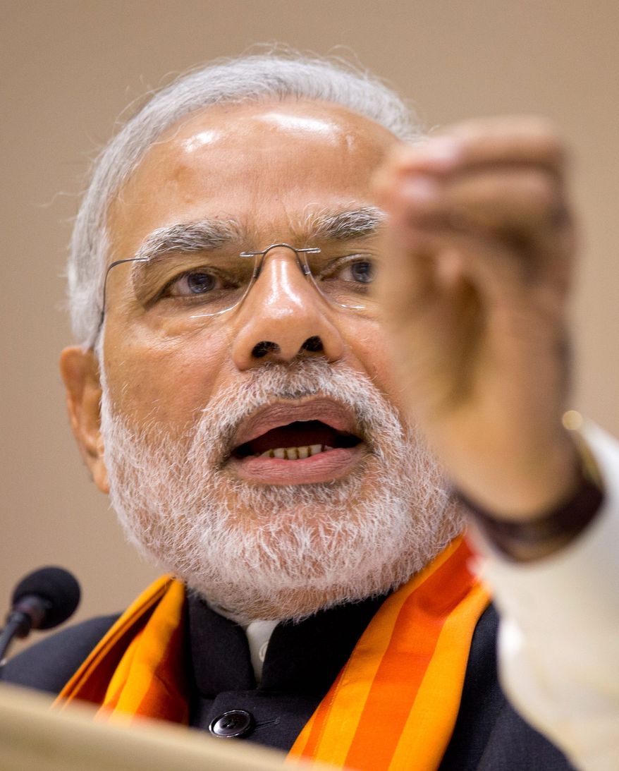 Critics accuse Indian Prime Minister Narendra Modi of favoring his own Hinduism over other religions. (Associated Press)