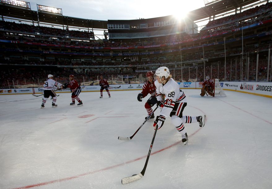 Chicago Blackhawks right wing Patrick Kane was one of the many players in Thursday's Winter Classic who had to adjust to the sun's glare on the ice at Nationals Park. (Associated Press)