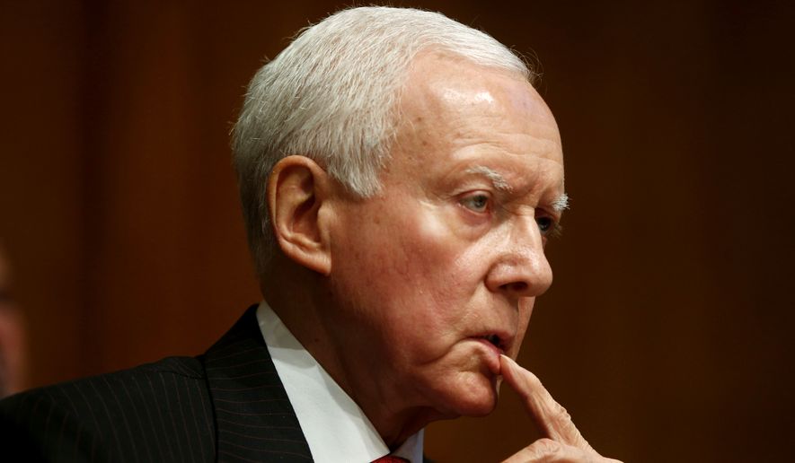FILE - In this May 21, 2013 file photo, Sen. Orrin Hatch of Utah listens on Capitol Hill in Washington. Republican senators poised to lead major committees when the GOP takes charge are intent on pushing back many of President Barack Obama&#x27;s policies, setting up potential showdowns over environmental rules, financial regulations and national security. (AP Photo/Charles Dharapak, File)