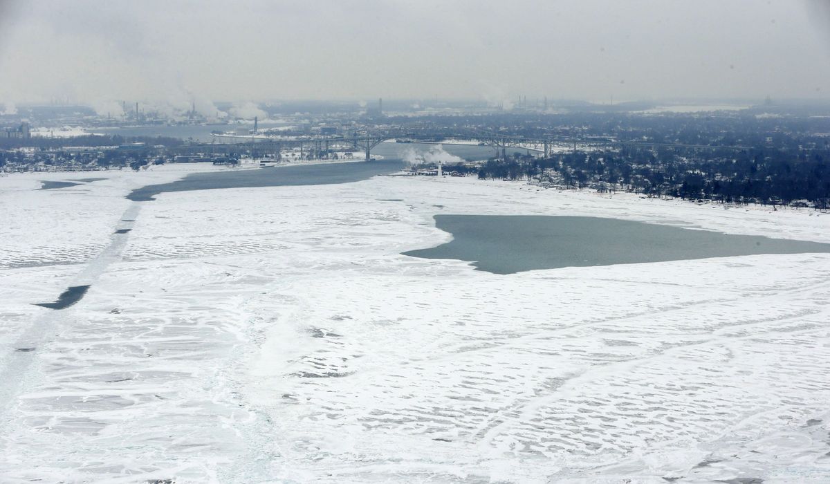 NextImg:Coast Guard rescues two stranded on Great Lakes ice floe in Michigan