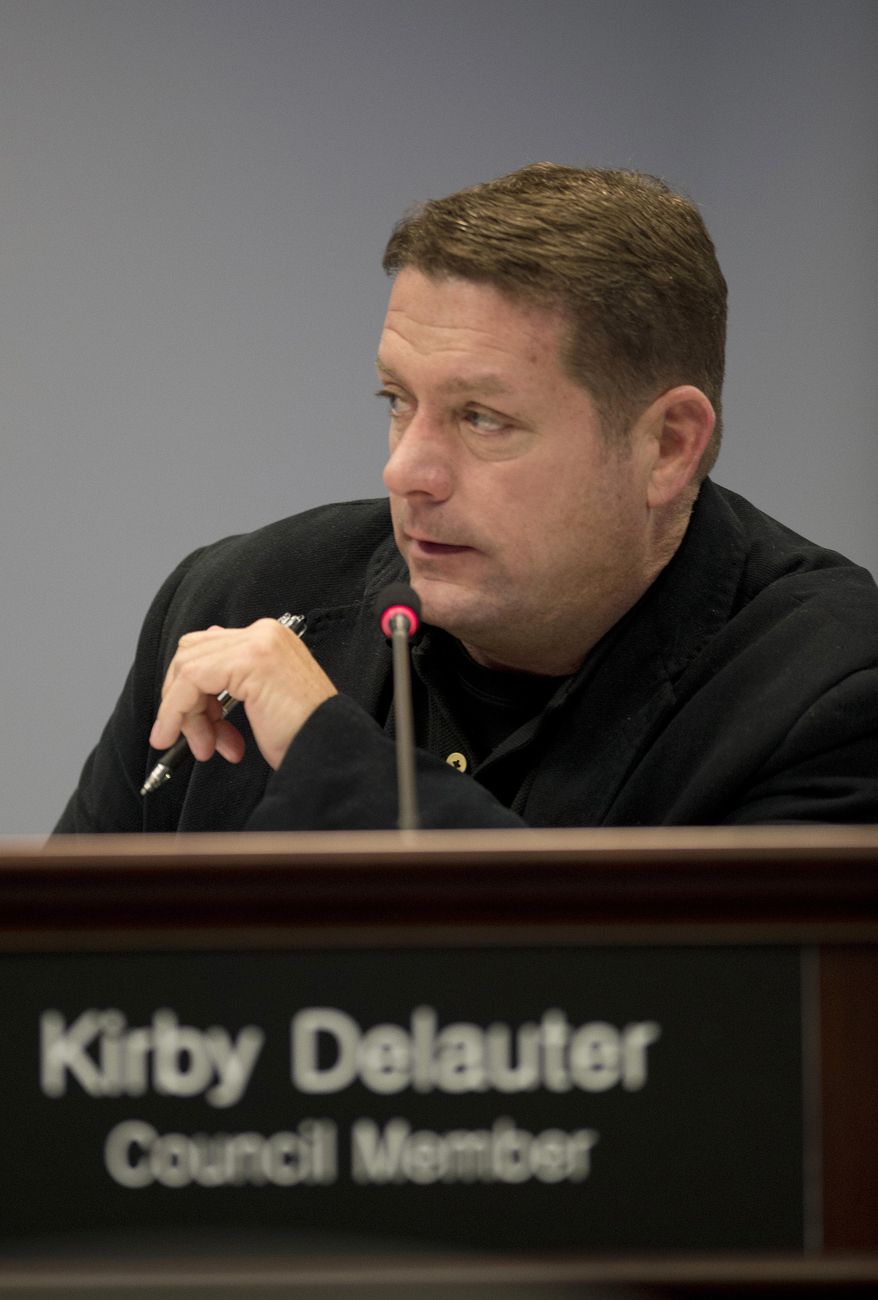 Frederick County Council member Kirby Delauter makes a point during a meeting of the recently formed 7-member council Tuesday afternoon, Jan. 6, 2015, at Winchester Hall in Frederick, Md. The Republican councilman is threatening to sue his local newspaper if they dare put his name on their pages. Delauter, who made the threat in a Facebook post lat Saturday, didn't respond Tuesday to phone and email messages. (AP Photo/The Frederick News-Post, Bill Green)