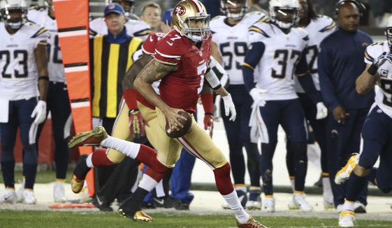 San Francisco 49 ers  Quarterback Colin Kaepernick  #7 during the first quarter in the game against the San Diego Chargers  at Levis Stadium during an NFL game in Santa Clara, Calif. on Sunday, Dec. 20 , 2014. (AP Photo/David Seelig)