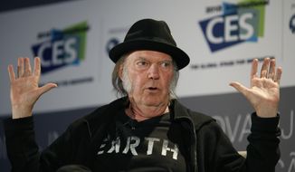 Musician Neil Young speaks during a session at the International CES Wednesday, Jan. 7, 2015, in Las Vegas. (AP Photo/John Locher)