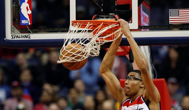 Wizards forward Otto Porter has seen his minutes cut as Martell Webster makes his way back into the rotation from his third career back surgery. Porter did not play Jan. 2 against Oklahoma City after playing just eight minutes against Dallas. (Associated Press)