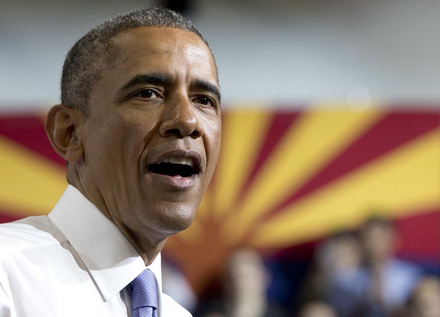 President Barack Obama speaks at Central High School, Thursday, Jan. 8, 2015, in Phoenix, about the recovering housing sector. (AP Photo/Carolyn Kaster)