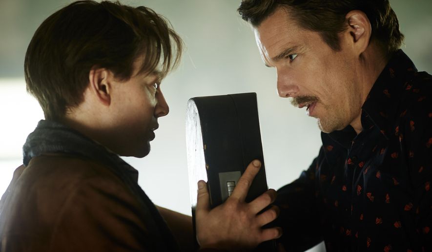 In this image released by Sony Pictures Worldwide Acquisitions, Sarah Snook, Left, and Ethan Hawke appear in a scene from the film, "Predestination." (AP Photo/Sony Pictures Worldwide Acquisitions, Ben King)