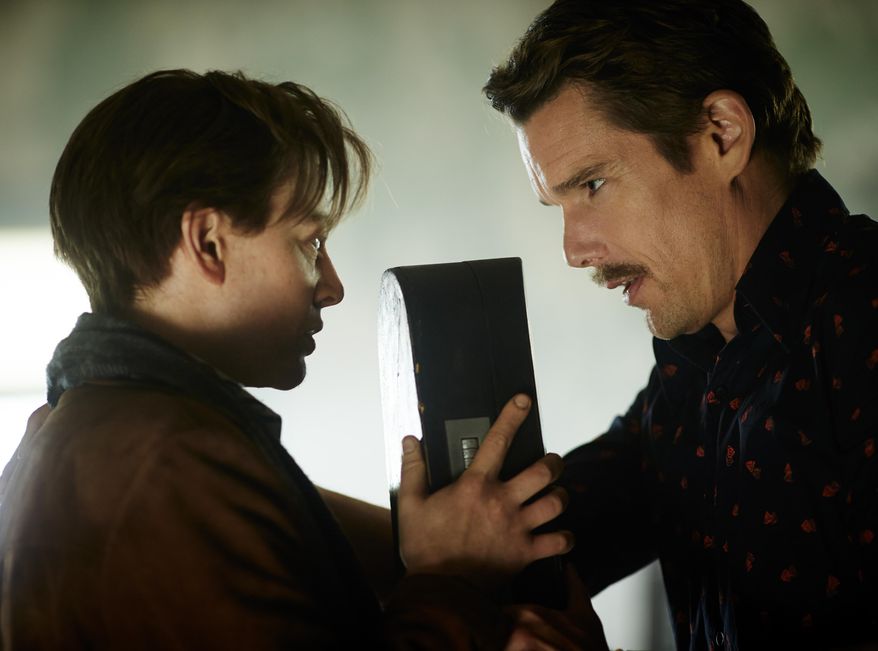 In this image released by Sony Pictures Worldwide Acquisitions, Sarah Snook, Left, and Ethan Hawke appear in a scene from the film, "Predestination." (AP Photo/Sony Pictures Worldwide Acquisitions, Ben King)