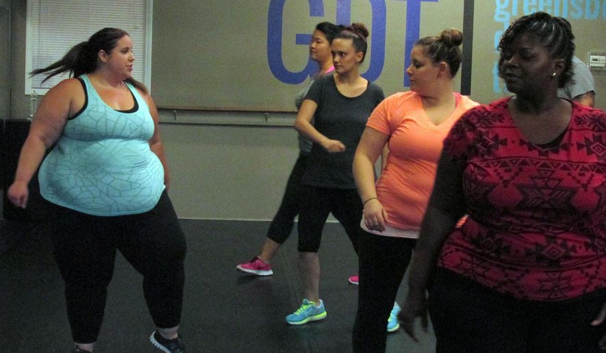 This photo provided by TLC/Discovery Communications shows Whitney Thore, left, in a scene from "My Big Fat Fabulous Life." The TLC network will premiere "My Big Fat Fabulous Life" on Jan. 13, 2015. (AP Photo/TLC/Discovery Communications)