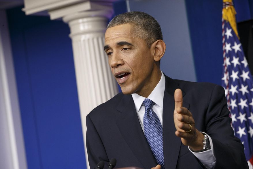 President Barack Obama speaks during a news conference in the Brady Press Briefing Room of the White House in Washington in this Dec. 19, 2014, file photo. (AP Photo/J. Scott Applewhite, File)