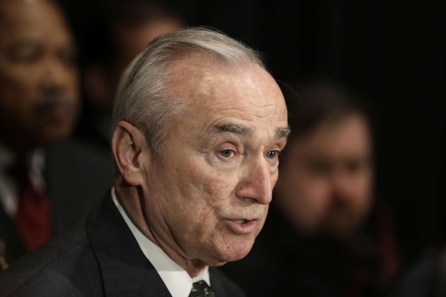 In this Jan. 7, 2015, file photo, New York City Police Commissioner Bill Bratton speaks to reporters after an NYPD swearing-in ceremony in New York. (AP Photo/Seth Wenig, File)