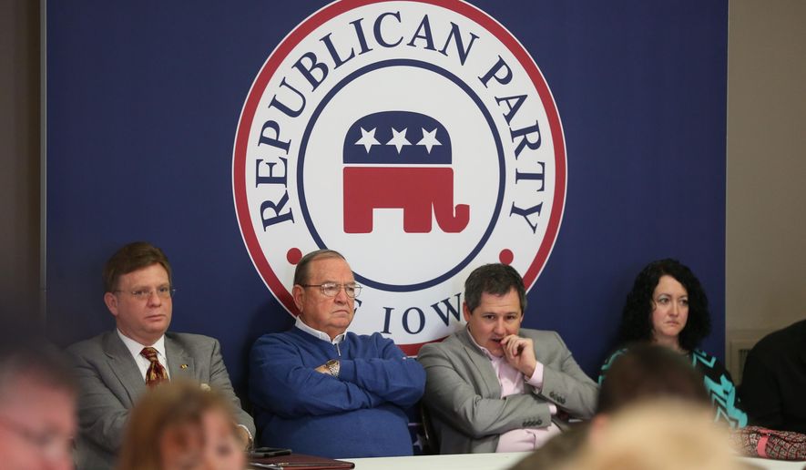 Iowa Republican Party members listen during a Jan. 10, 2015, meeting at the party headquarters in Des Moines to discuss whether the state party should carry on with a presidential straw poll. Despite criticism from some prominent Republicans, the Republican Party of Iowa&#39;s central committee unanimously voted to keep the event going. (Associated Press/The Des Moines Register, Charlie Litchfield) **FILE**