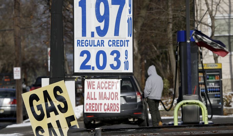 Gas prices under $2 a gallon are seen at a service station in Leonia, N.J., in this Jan. 9, 2015, file photo. (AP Photo/Seth Wenig, File)