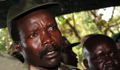 In this Nov. 12, 2006, file photo, the leader of the Lord&#x27;s Resistance Army, Joseph Kony answers journalists&#x27; questions following a meeting with U.N. humanitarian chief Jan Egeland at Ri-Kwangba in southern Sudan. (AP Photo/Stuart Price, File, Pool)