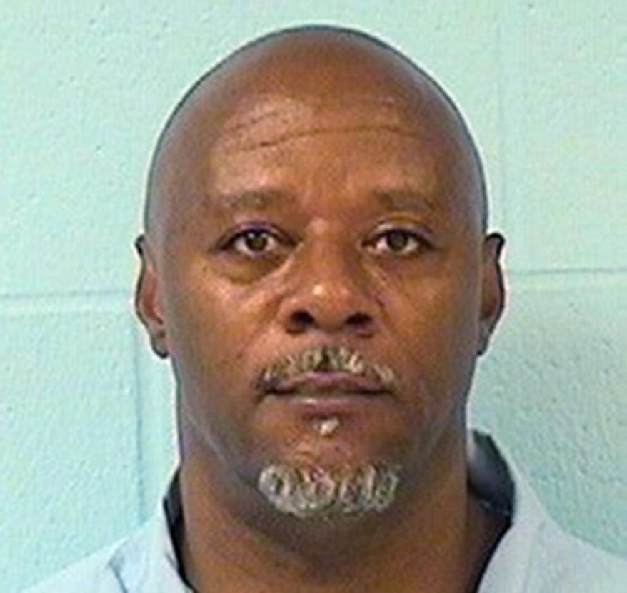 This undated photo provided by the Illinois Department of Corrections shows Tyrone Hood. Hood was convicted in the 1993 shooting death of an Illinois Institute of Technology basketball player. In his final moments as Illinois governor, Pat Quinn granted clemency to 43 people, commuted the sentences of Hood and five other people, and pardoned another based on innocence, his office announced Monday, Jan. 12, 2015 in Chicago. (AP Photo/Illinois Department of Corrections)