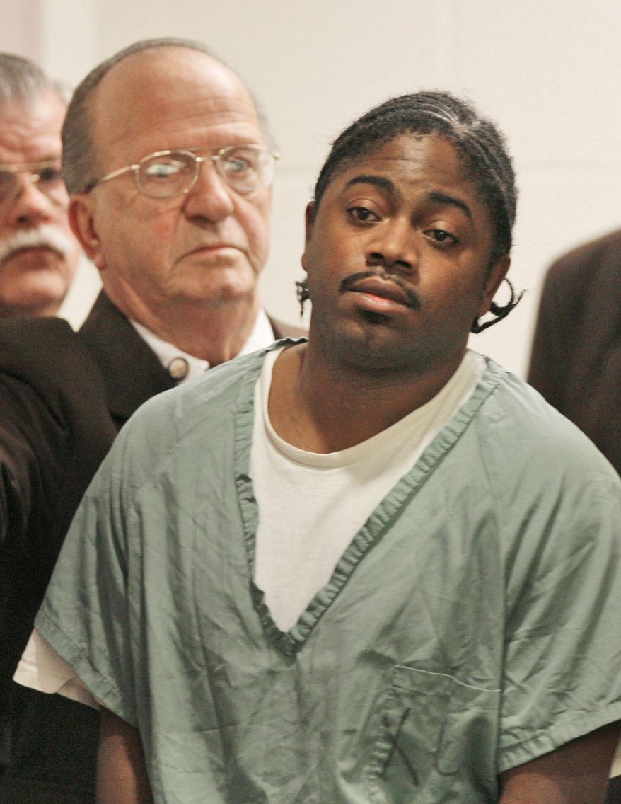 FILE - In this Friday, Nov. 17, 2006, file photo, Michael Addison arrives for his probable cause hearing in Manchester District Court in Manchester, N.H. Addison was convicted in the shooting death of Officer Michael Briggs. The New Hampshire Supreme Court will hold a hearing Thursday, Jan. 15, 2015, to review the fairness of the death sentence of the state's only death row inmate in comparison to other cases involving the fatal shootings of police officers. (AP Photo/Jim Cole, File)