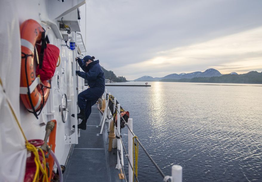 ADVANCE FOR SUNDAY JAN. 18 AND THEREAFTER - In this Jan. 8, 2015 photo, United States Coast Guard Lt. j.g. Rebecca Rebar climbs down from the bridge of the cutter Chandeleur. The Chandeleur, a 110-foot cutter with a 17-person crew that was commissioned in 1988, went back in the water on Dec. 30 after being in the base’s dry dock since late July, according to Lt. Rebar, the cutter’s executive officer. (AP Photo/Ketchikan Daily News, Taylor Balkom)