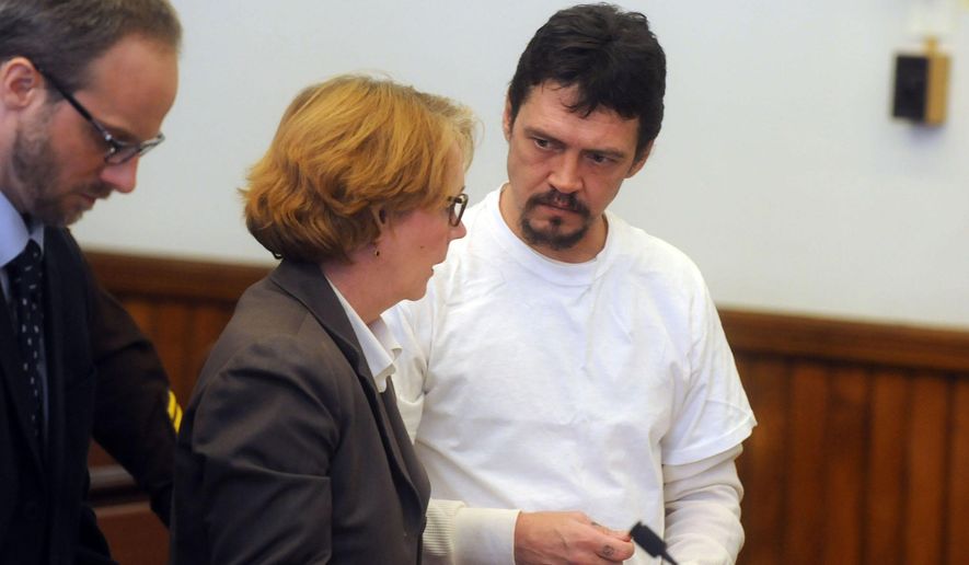 FILE - In this Thursday Jan. 9, 2014 file photo James Robarge, right, talks during his arraignment in Sullivan Country Superior Court in Newport, N.H. Robarge, from Vermont, is accused of killing his wife in New Hampshire just hours after she filed for divorce. (AP Photo/Valley News, Sarah Priestap, File)