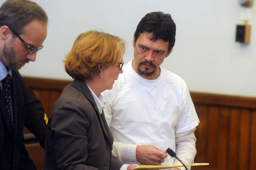 FILE - In this Thursday Jan. 9, 2014 file photo James Robarge, right, talks during his arraignment in Sullivan Country Superior Court in Newport, N.H. Robarge, from Vermont, is accused of killing his wife in New Hampshire just hours after she filed for divorce. (AP Photo/Valley News, Sarah Priestap, File)