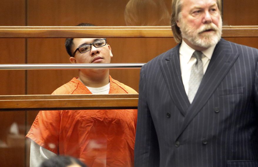 Alberto Ochoa, left, appears in Los Angeles Superior Court Monday, Jan. 12, 2015 with his attorney Christopher C. Chaney, as one of four defendants being charged in connection to the 2014 beating death of USC graduate student Xinran Ji student during an attempted robbery. (AP Photo/Los Angeles Times, Al Seib, Pool)
