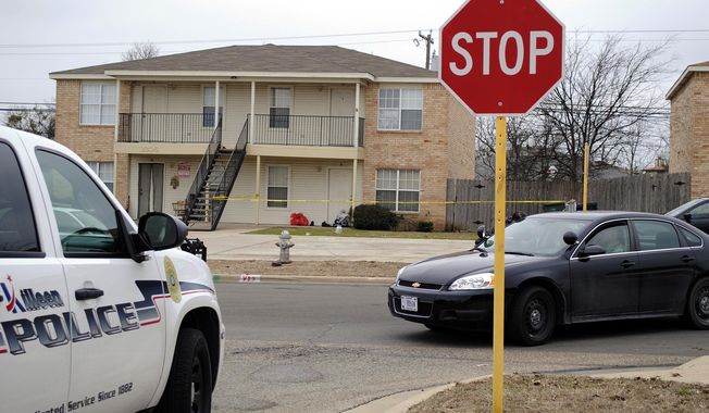 Killeen police investigate the death of a Fort Hood soldier who was found dead at his Killeen, Texas, home on Tuesday, Jan. 13, 2015. (AP Photo/The Killeen Daily Herald, Eric J. Shelton) ** FILE **