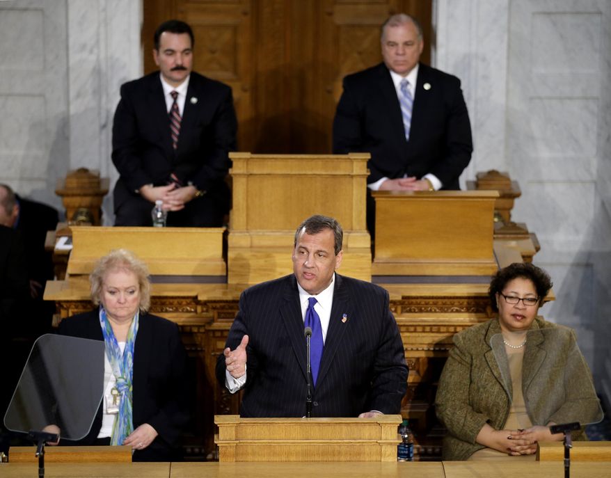 New Jersey Gov. Chris Christie, center bottom, delivers his State Of The State address, Tuesday, Jan. 13, 2015, in Trenton, N.J. (AP Photo/Mel Evans)