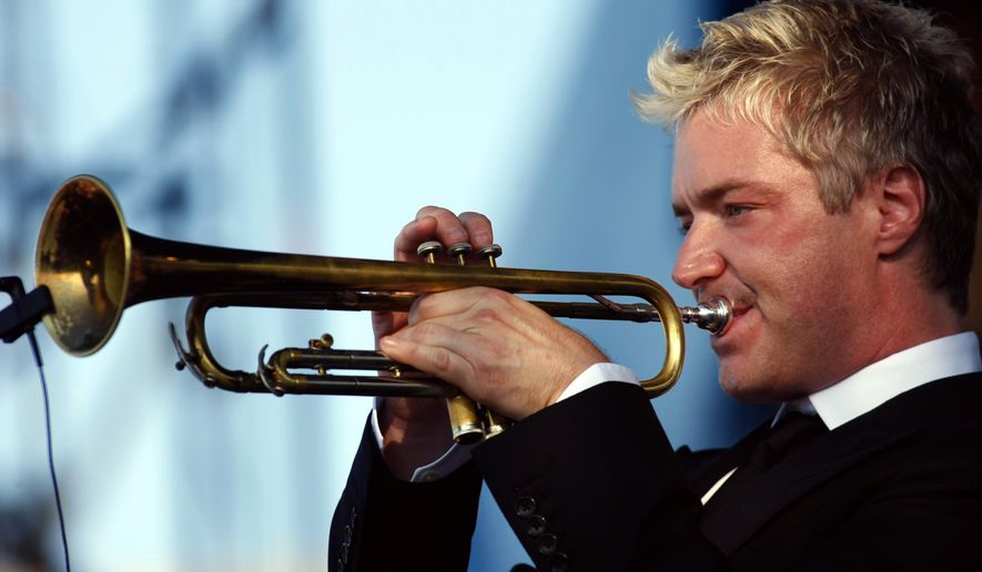 FILE- In this Aug. 8, 2010, file photo, Chris Botti performs at the CareFusion Newport Jazz Festival in Newport, R.I. Festival producer George Wein announced the lineup Tuesday, Jan. 13, 2015, for this years festival and Botti, vocalist Cassandra Wilson and Dr. John are among the biggest names playing. (AP Photo/Joe Giblin, File)