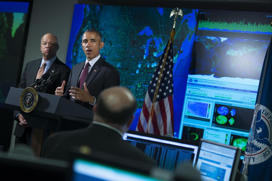 Homeland Security Secretary Jeh Johnson listens at left as President Barack Obama speaks at the National Cybersecurity and Communications Integration Center in Arlington, Va., Tuesday, Jan. 13, 2015. Obama renewed his call for Congress to pass cybersecurity legislation, including a proposal that encourages companies to share threat information with the government and protects them from potential lawsuits if they do. (AP Photo/Evan Vucci)