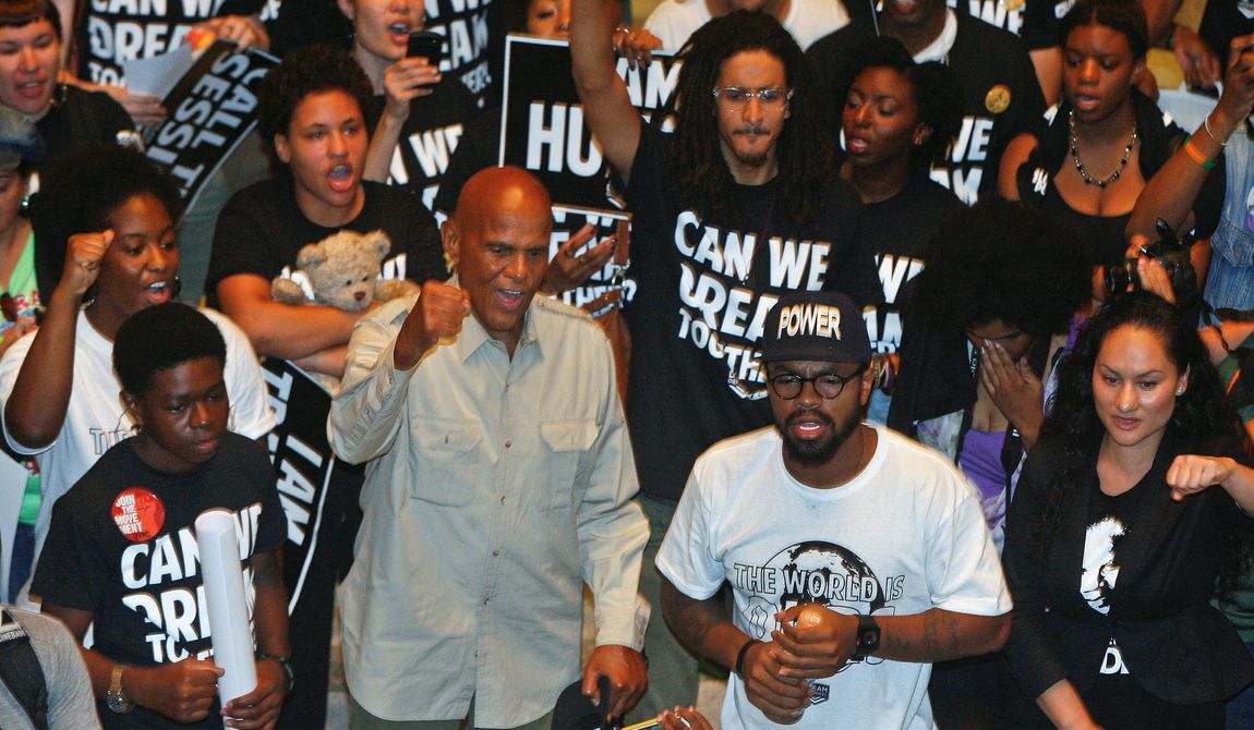 Singer and social activist Harry Belafonte Jr. (center) worked with organizations that established the &quot;Heads Up Coalition,&quot; funded by George Soros&#x27; Tides Foundation, based on later-debunked notions that Michael Brown&#x27;s hands were up before being shot. (associated press)
