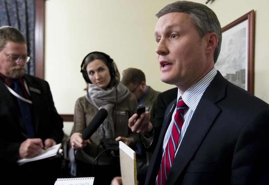 Rep. Brent Crane, R-Nampa, talks to the media during a House Ways and Means meeting Wednesday, Jan. 14, 2015, to introduce a bill presented by House Minority Leader John Rusche, D-Lewiston in Boise, Idaho. Idaho Republican leaders announced a change of course Wednesday and approved the introduction of a bill that would include sexual orientation and gender identity protections in the state's Human Rights Act. (AP Photo/The Idaho Statesman, Darin Oswald)