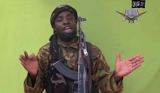 This file photo taken from video by Nigeria&#39;s Boko Haram terrorist network, Monday, May 12, 2014, shows their  leader Abubakar Shekau speaking to the camera. (AP Photo) (Associated Press) ** FILE **