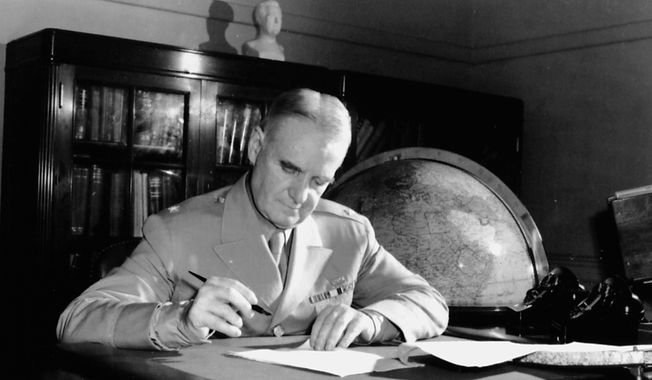 General William Donovan works in the OSS headquarters offices during World War II. (OSS Society)