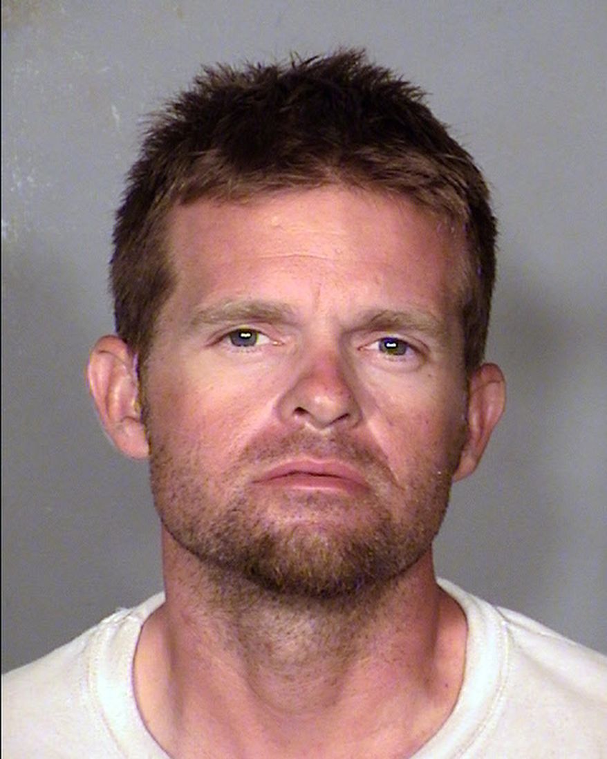 FILE - This undated file booking photo provided by the Las Vegas Metropolitan Police Department shows Cliven Lance Bundy. Bundy, 35, the adult son of southern Nevada rancher and states’ rights advocate Cliven Bundy, was told by a judge on Thursday, Jan. 15, 2015 that he faces prison time following his arrest on parole violations and a drug court arrest warrant. (AP Photo/Las Vegas Metropolitan Police Department, File)